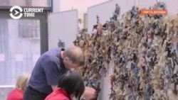 Volunteers And Refugees In Estonia Weave Camouflage Nets For Ukrainian Army
