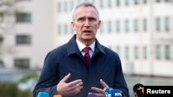NATO Secretary-General Jens Stoltenberg said Pristina and Belgrade must engage in EU-led dialogue. (file photo)
