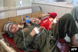 Injured Afghan children in Jalalabad receive treatment at a hospital on September 1, the day after the deadly earthquake.