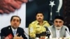 Head of the Afghan delegation, Abdullah Abdullah (left) speaks during a joint press conference with Pakistani delegation head Owais Ghani
