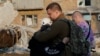 Survivors Of Russia's Attack On Kyiv Sort Through Aftermath2 GRAB