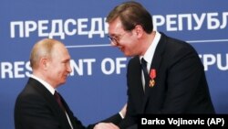 Уладзімір Пуцін і Аляксандар Вучыч, архіўнае фота
