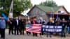 Moldovans welcome the U.S. troops at the Sculeni border crossing. A pro-Russian opposition party had called for demonstrators to block the route, but fewer than a dozen turned up.