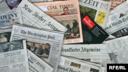 Generic – A photo of International and Russian newspapers, Prague, 19Jun2014