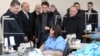 Armenia - Prime Minister Tigran Sarkisian (L) visits a textile factory in Amasia, Shirak province, 7Dec2011.