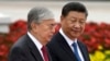 Qasym-Zhomart Toqaev (left) and Xi Jinping meet in Beijing in 2019.