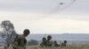 Kyrgyzstan -- Servicemen take part in the Collective Security Treaty Organisation (CSTO) military exercises outside Bishkek, 21Sep2011