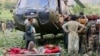 Injured victims of an earthquake that killed many people and destroyed several villages in eastern Afghanistan are evacuated by military helicopter in Kunar Province on September 1. 