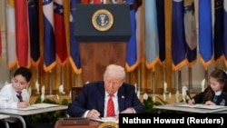 Дональд Трамп на церемонии в Белом доме 20 марта
