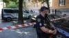 A police officer guards the murder site of former Ukrainian parliamentary speaker Andriy Parubiy in Lviv.