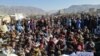 A protest for Internet services makes its way through the main bazaar in Wana, South Waziristan, on February 11. 