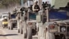 U.S. military vehicles on the streets of western Afghanistan