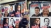 Freedom of information is urged on French presidential campaign posters in Paris.