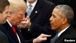 Președintele Donald Trump și fostul președinte Barack Obama la ceremonia de inaugurare a noului președinte, Washington, 20 ianuarie 2017