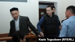 «Жихадчылар иши» боюнча соттолгондор Кенжебек Абишев менен Алмат Жумагулов. 26-сентябрь, 2018-жыл.