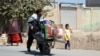 Thousands Flee As Taliban Take Key Afghan District