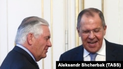 Tillerson (left) with Russian Foreign Minister Sergei Lavrov in Vienna in December