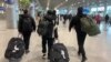 Таъхир дар парвозҳо ба Русия муҳоҷиронро сарсон кард
