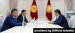 President Sooronbai Jeenbekov (righty) meets with the speaker of parliament, Kanatbek Isaev (left) and Prime Minister Sadyr Japarov in Bishkek on October 14.