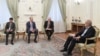 Iran- Iranian President Masoud Pezeshkian (right) meets Armen Grigorian, secretary of Armenia's Security Council, in Tehran August 30, 2025.