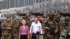 Фон дер Ляйен и премьер Польши Дональд Туск с военными