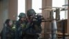 Українські військові ведуть бій з бойовиками в Іловайську, 26 серпня 2014 року
